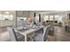 View of dining area with decor flows into kitchen and living room at 1610 Reynolds Rd # 5, Lakeland, FL 33801