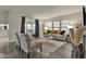 Bright living area with stylish seating, wood-look floors, and a comfortable sofa at 1610 Reynolds Rd # 5, Lakeland, FL 33801