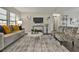 Inviting living room with patterned chairs, modern decor, and stylish area rug at 1610 Reynolds Rd # 5, Lakeland, FL 33801