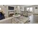 Modern living room with stylish furniture, decor and neutral color palette at 1610 Reynolds Rd # 5, Lakeland, FL 33801
