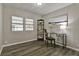 Cozy office space with natural light, wood-look floors, and modern desk setup for productivity at 1610 Reynolds Rd # 5, Lakeland, FL 33801
