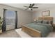 Serene bedroom featuring a cozy bed, soft lighting, and relaxing decor for a peaceful night's sleep at 358 Canna Dr, Davenport, FL 33897