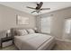 Comfortable bedroom with a neutral color palette, soft lighting, and simple decor creating a calming atmosphere at 358 Canna Dr, Davenport, FL 33897