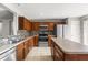 Well-equipped kitchen with stainless steel appliances, ample counter space, and stylish backsplash at 358 Canna Dr, Davenport, FL 33897