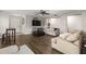 Large living room with modern flooring, comfortable couches, and an open layout at 358 Canna Dr, Davenport, FL 33897