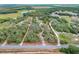 Aerial view of property boundaries showcasing the home and surrounding wooded areas at 3979 Mammoth Grove Rd, Lake Wales, FL 33898