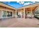 Expansive patio area with outdoor kitchen and seating, perfect for entertaining with a view of the yard at 3979 Mammoth Grove Rd, Lake Wales, FL 33898