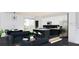 Open-concept living room and kitchen offer plenty of space for entertaining and relaxation at 481 S East Ave, Bartow, FL 33830