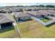 This expansive backyard features lush lawn and patio, enclosed by a privacy fence, ideal for outdoor enjoyment at 8830 Fox Dr, Polk City, FL 33868
