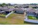Spacious backyard featuring a well-maintained lawn and white privacy fence, perfect for outdoor activities and relaxation at 8830 Fox Dr, Polk City, FL 33868