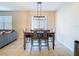 Comfortable dining area with modern lighting and bright natural light at 8830 Fox Dr, Polk City, FL 33868