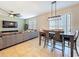 Bright dining area features modern light fixture, and plenty of natural light at 8830 Fox Dr, Polk City, FL 33868