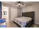 Comfortable bedroom with carpet, and a view into the en-suite bathroom at 1123 Sugarwood St, Davenport, FL 33837