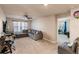 Spacious bonus room featuring plush carpet, neutral paint, and comfortable seating at 1123 Sugarwood St, Davenport, FL 33837