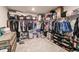 Spacious walk-in closet with ample storage for clothing, shoes, and accessories at 1123 Sugarwood St, Davenport, FL 33837