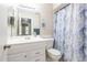 Bright bathroom featuring a vanity, mirror, and tiled floors at 5926 N Fork Ct, Lakeland, FL 33809