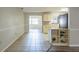 Dining area with tile flooring, adjacent to the kitchen, offers easy access and an open flow for dining and entertaining at 5926 N Fork Ct, Lakeland, FL 33809