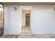 Covered entrance featuring a tiled floor with view into the property and covered porch at 5926 N Fork Ct, Lakeland, FL 33809