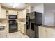 Efficient kitchen with modern appliances and ample cabinet space, providing a functional cooking area at 5926 N Fork Ct, Lakeland, FL 33809