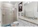 Bathroom with shower, toilet, and vanity with granite counters at 7614 Oak Spring Ln, Davenport, FL 33837
