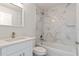 Bathroom with a vanity, toilet, and a shower-tub with marble-look tile at 2680 Sw 144 Ct, Ocala, FL 34481