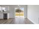 Bright dining area featuring sliding glass doors and view of the backyard at 2680 Sw 144 Ct, Ocala, FL 34481