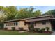 Charming single-story home featuring a well-maintained lawn and neutral exterior paint scheme at 2818 Dellwood Dr, Orlando, FL 32806