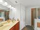 Bathroom with double sink vanity and tiled walk-in shower at 3125 Kearns Rd, Mulberry, FL 33860