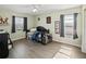 Cozy bedroom with two windows and neutral walls offering abundant natural light and ample space at 3125 Kearns Rd, Mulberry, FL 33860