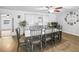 Bright dining room features a large table, chairs, and a view of the backyard at 3125 Kearns Rd, Mulberry, FL 33860