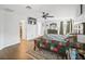 Bright main bedroom featuring a ceiling fan and access to ensuite bathroom and walk-in closet at 3125 Kearns Rd, Mulberry, FL 33860