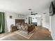 Large main bedroom featuring a ceiling fan and access to ensuite bathroom at 3125 Kearns Rd, Mulberry, FL 33860