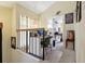 Upstairs loft area converted to office space with natural light and modern decor at 4836 Pebble Beach Dr, Orlando, FL 32811