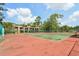 Community tennis courts perfect for active lifestyles and friendly matches in a verdant, landscaped setting at 4836 Pebble Beach Dr, Orlando, FL 32811