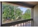 Balcony view showing lush greenery and calm waters at 4836 Pebble Beach Dr, Orlando, FL 32811
