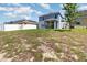 Well maintained backyard with a spacious lawn area perfect for outdoor activities at 6889 Wilson Hammock Ave, Groveland, FL 34736