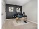 Bright office with a large desk and a comfortable chair at 6889 Wilson Hammock Ave, Groveland, FL 34736