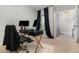 Comfortable office space with plush carpet and a view to the front entrance at 6889 Wilson Hammock Ave, Groveland, FL 34736