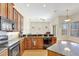 Spacious kitchen with granite countertops, stainless steel appliances, and plenty of cabinet space at 13708 Old Dock Rd, Orlando, FL 32828