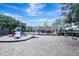 Community playground with slide, swing set, and bench seating at 13708 Old Dock Rd, Orlando, FL 32828