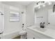 Well-lit bathroom with updated fixtures and a tub-shower combo at 2791 Citron Dr, Longwood, FL 32779