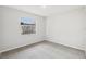 Bright bedroom with a large window and cozy carpeting at 2791 Citron Dr, Longwood, FL 32779