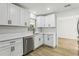 Modern kitchen featuring white cabinets, stainless steel appliances, quartz counters, and recessed lighting at 2791 Citron Dr, Longwood, FL 32779