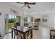 Dining room with large sliding glass doors for easy access to the outdoors and a ceiling fan at 3550 Rodrick Cir, Orlando, FL 32824