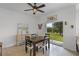 Cozy dining area adjacent to the kitchen, featuring a sliding glass door leading to the backyard at 3550 Rodrick Cir, Orlando, FL 32824