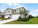 Charming two-story home with a two car garage and landscaped yard at 3550 Rodrick Cir, Orlando, FL 32824