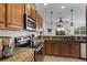 Kitchen featuring stainless steel appliances, granite countertops, and an inviting open layout at 3550 Rodrick Cir, Orlando, FL 32824