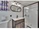 Modern bathroom featuring a vanity with stylish mirror, and a glass shower stall at 4145 Willow Oak Rd, Mulberry, FL 33860
