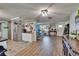 Open-concept living space connects dining area with a seamlessly open, functional floorplan at 4145 Willow Oak Rd, Mulberry, FL 33860