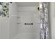 Shower and tub combination with three storage shelves at 4145 Willow Oak Rd, Mulberry, FL 33860